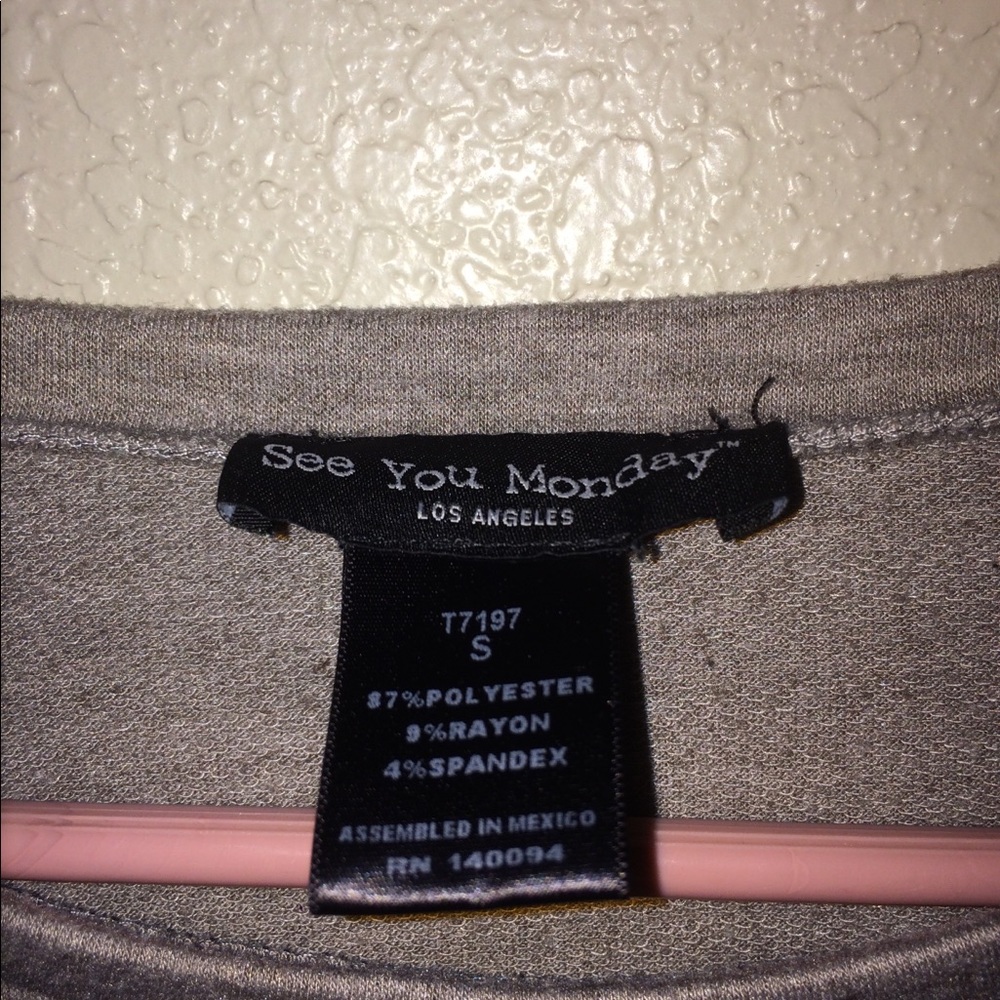 Grey long sleeve with cuts in the front